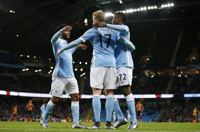 Kevin De Bruyne, Kelechi Iheanacho and Raheem Sterling celebrate during their team’s League Cup win on Tuesday to reach the semi-finals. Phil Noble / Reuters
