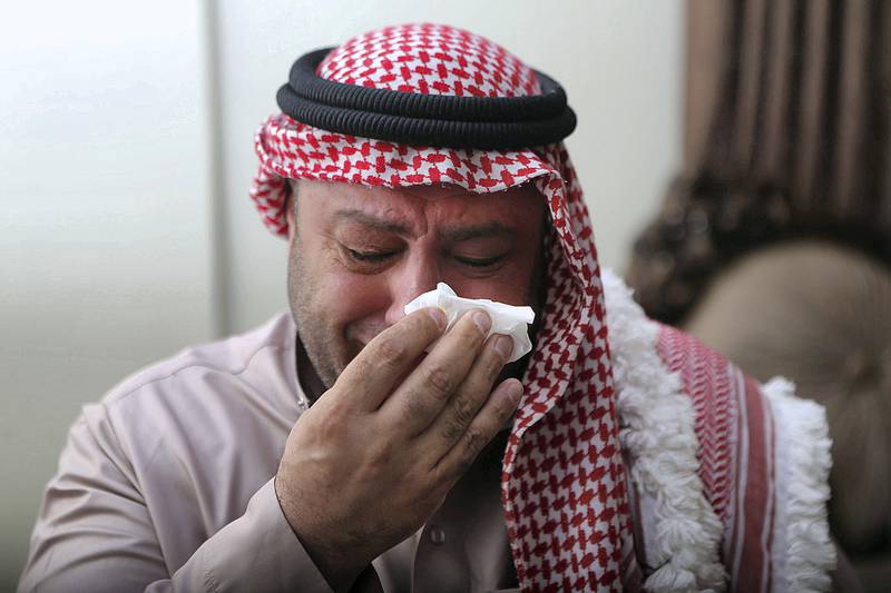 Zakaria Jawabreh, father of the Jordanian teenager who was killed by an Israeli embassy guard around the embassy compound last week, reacts during an interview for The National at his home in Amman, Jordan. (Salah Malkawi for The National)