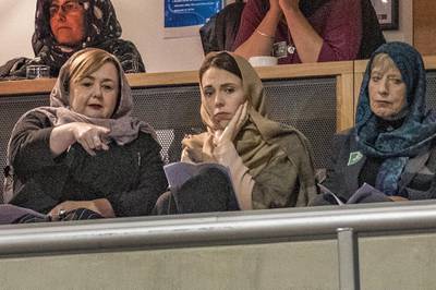 New Zealand Prime Minister Jacinda Ardern,  flanked by Minister of Housing Megan Woods, lefts and Christchurch Mayor Lianne Dalziel, attend a prayer service at the Horncastle Arena in Christchurch on March 13, 2020. AFP