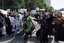 Taliban use violence to break up rare women's protest
