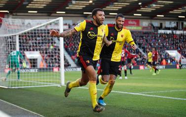 Troy Deeney and his teammates in action at Vicarage Road, a stadium the chairman Scott Duxbury wants to use as the venue for remaining games. Reuters