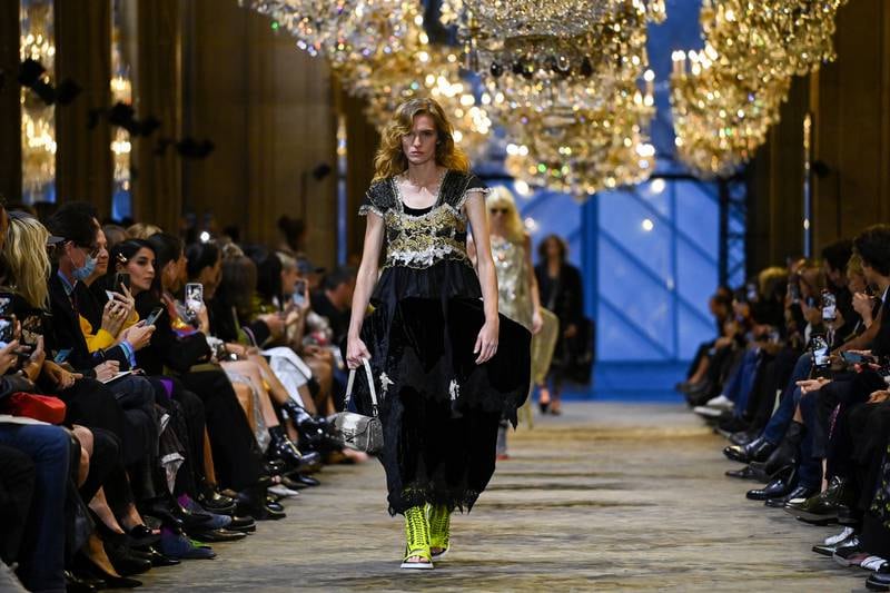 A model takes to the catwalk during the Louis Vuitton fashion show