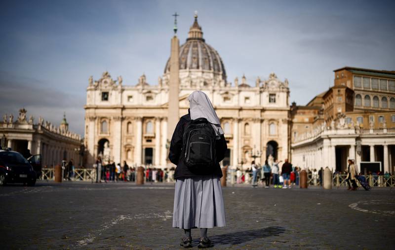 A nun in St Peter’s Square, the Vatican, after Pope Francis was taken to hospital for treatment for a respiratory infection. Reuters
