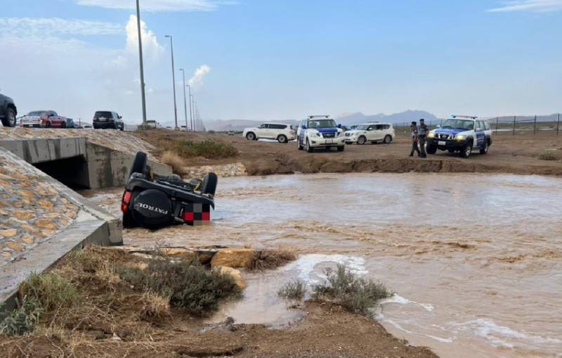 Police say a motorist crashed in Al Ain while taking pictures of floods. Picture: Abu Dhabi Police