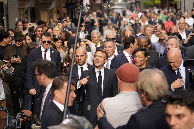 A sea of people followed Mr Macron as he made his way through the French Quarter. AP