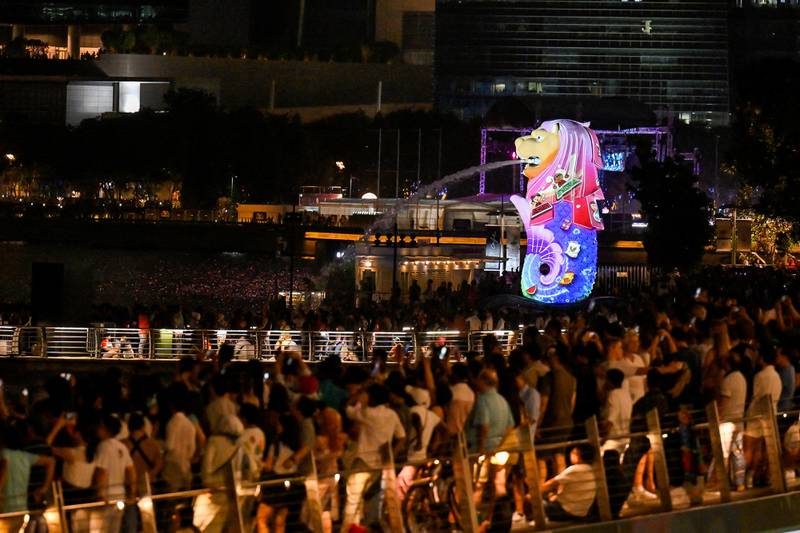 Crowds wait for the countdown to 2023 at Marina Bay in Singapore. Reuters