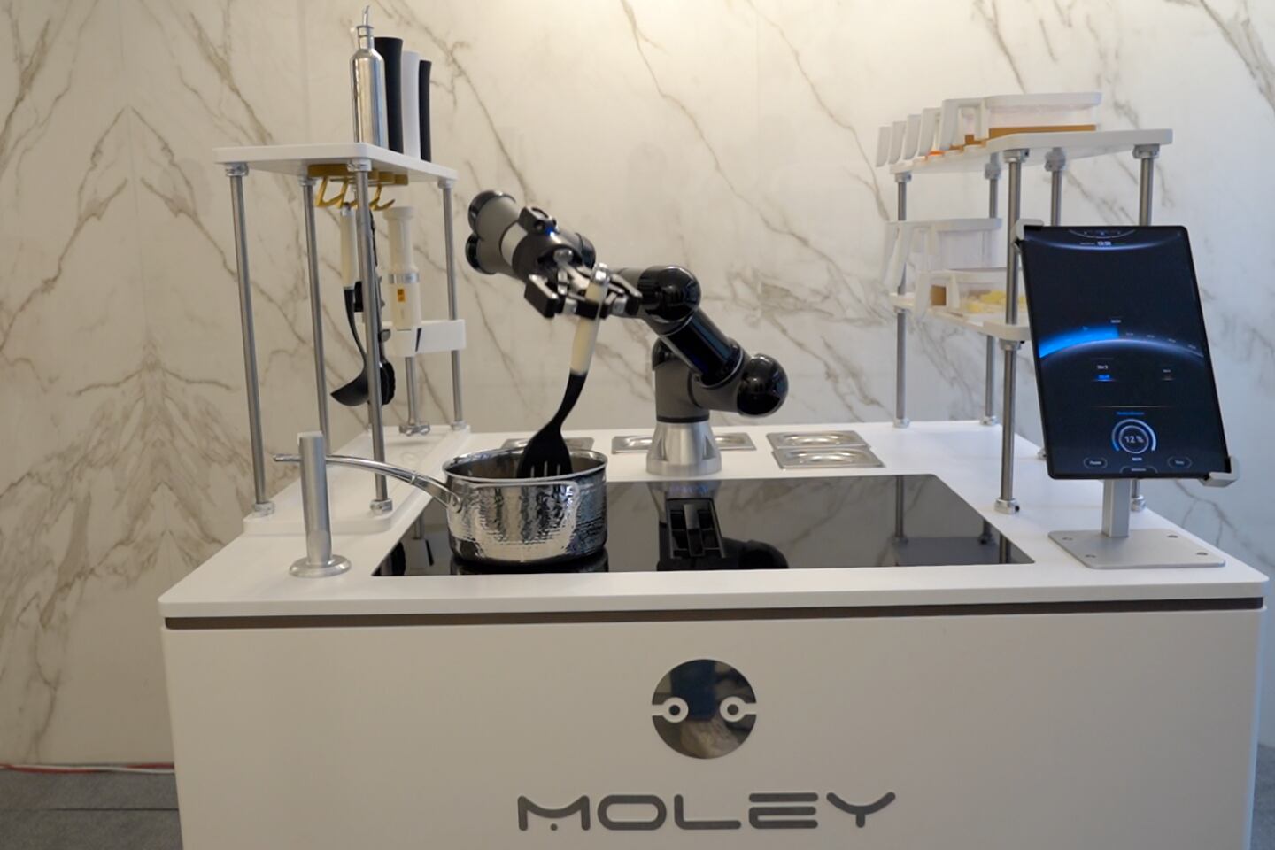 Moley demonstrates robotic kitchen unit