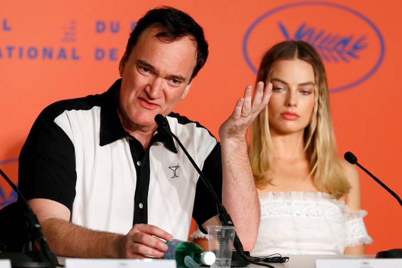 CANNES, FRANCE - MAY 22: Director Quentin Tarantino and Margot Robbie attend the "Once Upon A Time In Hollywood" Press Conference during the 72nd annual Cannes Film Festival on May 22, 2019 in Cannes, France. (Photo by John Phillips/Getty Images)