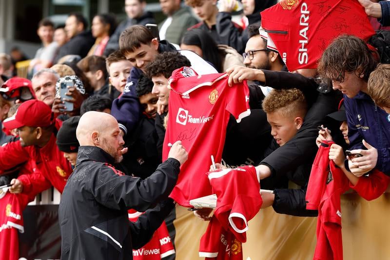 Erik ten Hag, manager of Manchester United signs autographs. Getty Images