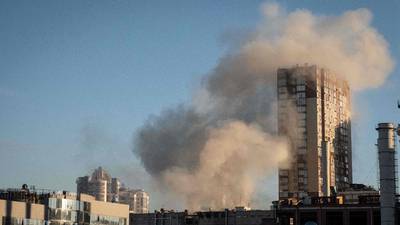 Smoke rises from a building after a drone attack. AFP