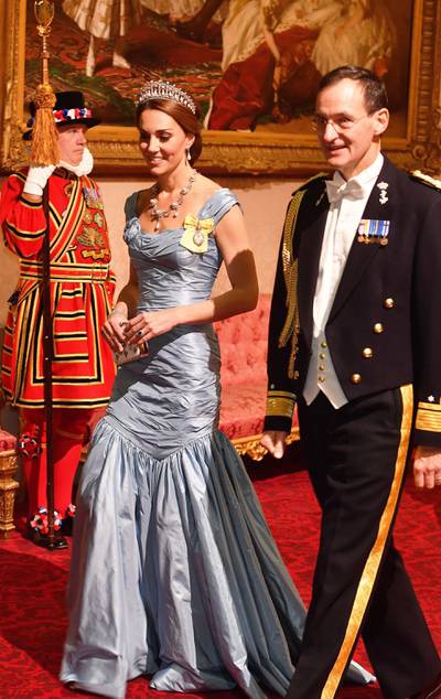 LONDON, ENGLAND - OCTOBER 23: Catherine, Duchess of Cambridge walks with Rear Admiral Ludger Brummelaar during a State Banquet at Buckingham Palace on October 23, 2018 in London, United Kingdom. King Willem-Alexander of the Netherlands accompanied by Queen Maxima are staying at Buckingham Palace during their two day stay in the UK. The last State Visit from the Netherlands was by Queen Beatrix and Prince Claus in 1982. (Photo by John Stillwell - WPA Pool/Getty Images)
