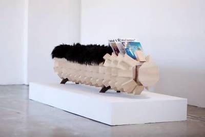 Fallen Palm bench with goat hair detail, magazine rack and drawers on both ends. Sarah Dea / The National