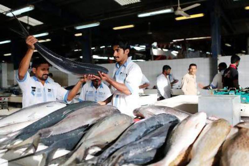 Fishmongers ply their trade in Dubai. Consumer demand is rising and catch levels are higher than national waters can sustainably provide. Ahmed Jadallah / Reuters