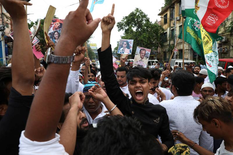 Muslims in Kolkata, India, shout slogans during a protest demanding the arrest of Bharatiya Janata Party (BJP) member Nupur Sharma for her comments about the Prophet Mohammed. Reuters