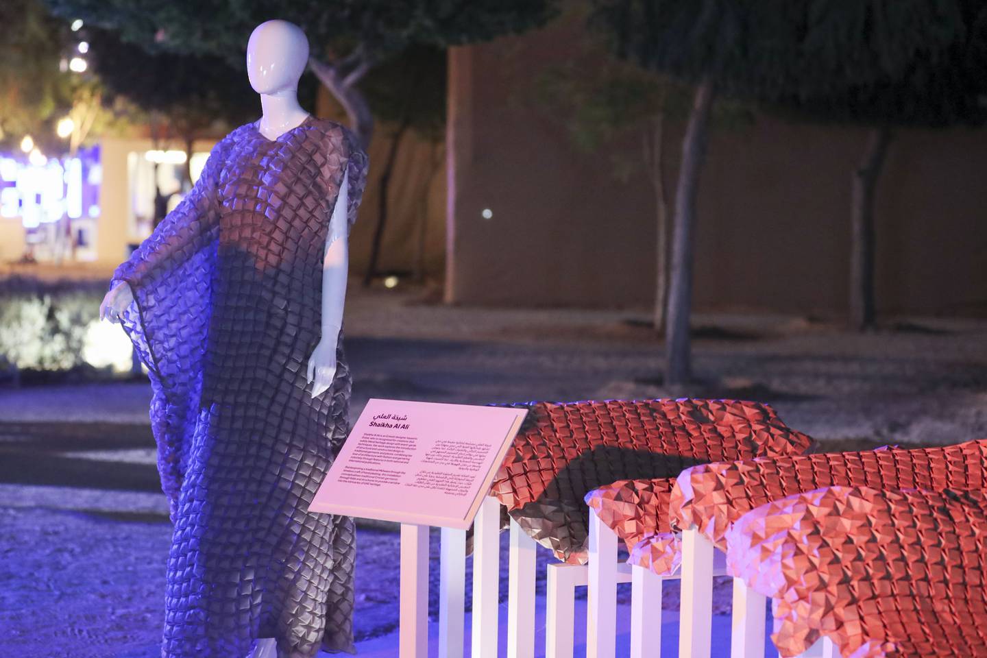 Shaikha Al Ali, an Emirati designer based in Dubai, and her creation at Al Hosn Festival. Khushnum Bhandari / The National