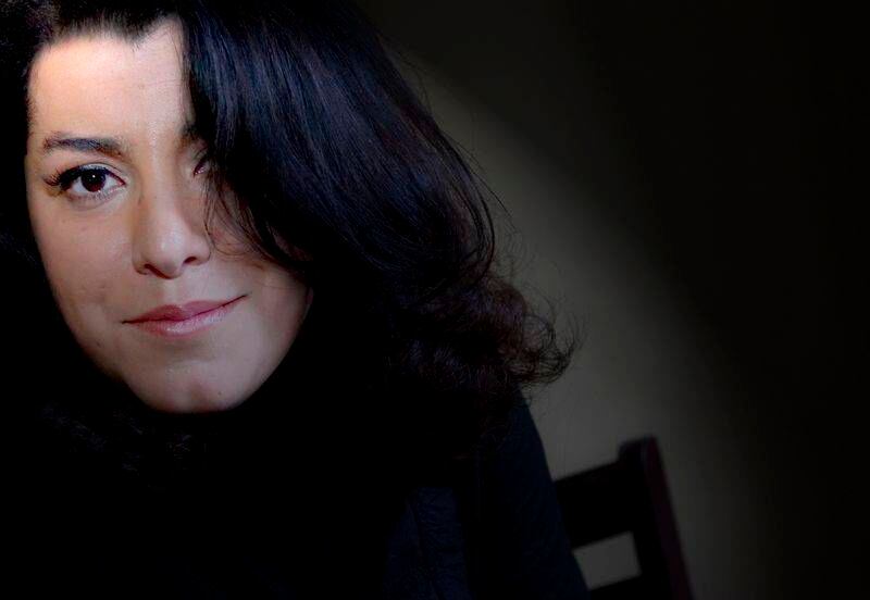 Author and actress Marjane Satrapi sits for photographs Friday, Dec. 14, 2007 in New York.The movie "Persepolis," based on the novel of the same name, written by Satrapi, is a hand drawn animated work about a young girl in Iran during the Islamic revolution. (AP Photo/Stephen Chernin)