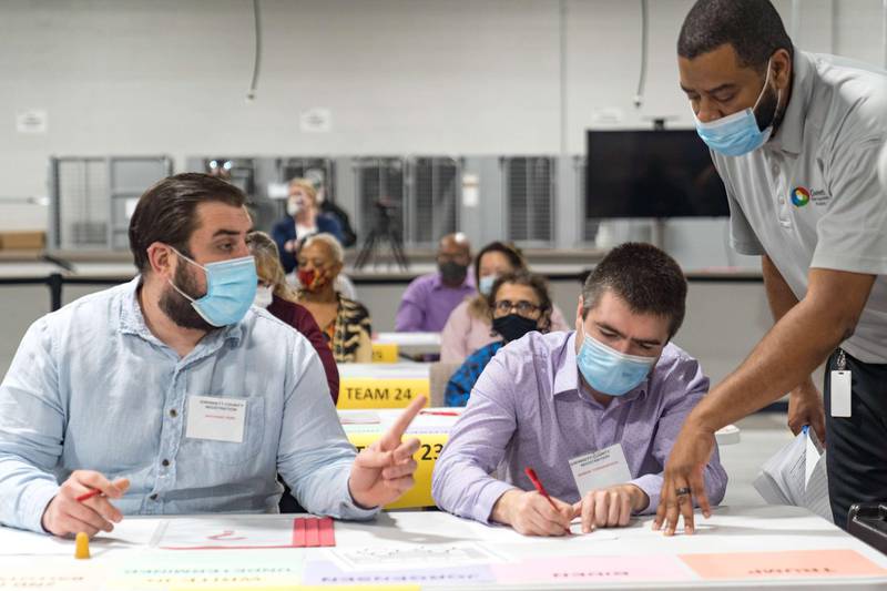 ATLANTA, GA - NOVEMBER 13: Gwinnett county workers begin their recount of the ballots on November 13, 2020 in Lawrenceville, Georgia. The difference in votes between US President Donald Trump and President-elect Joe Biden is about 14,000 as of right now.   Megan Varner/Getty Images/AFP
== FOR NEWSPAPERS, INTERNET, TELCOS & TELEVISION USE ONLY ==
