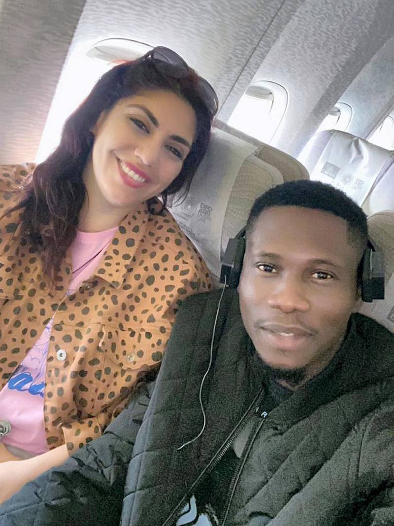 Heba and Olufemi pictured on an Emirates flight home from Colombo to Dubai