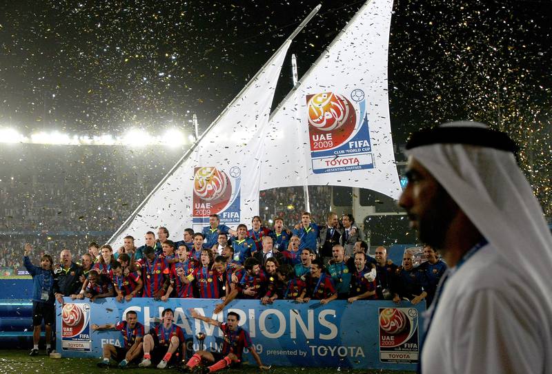 Barcelona's players celebrate after winning the 2009 Fifa Club World Cup at Zayed Sports City Stadium in Abu Dhabi. AFP