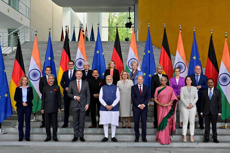 Mr Scholz and Mr Modi with participants of the Indo-German governmental consultations. AFP