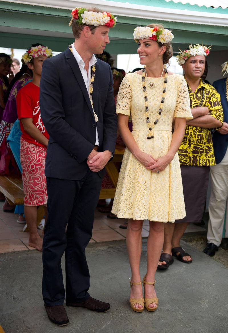 TUVALU - SEPTEMBER 18: Prince William, Duke of Cambridge and Catherine, Duchess of Cambridge visit Nauti Primary School on September 18, 2012 in Tuvalu. Prince William, Duke of Cambridge and Catherine, Duchess of Cambridge are on a Diamond Jubilee tour representing the Queen taking in Singapore, Malaysia, the Solomon Islands and Tuvalu.  (Photo by Arthur Edwards - Pool/Getty Images)