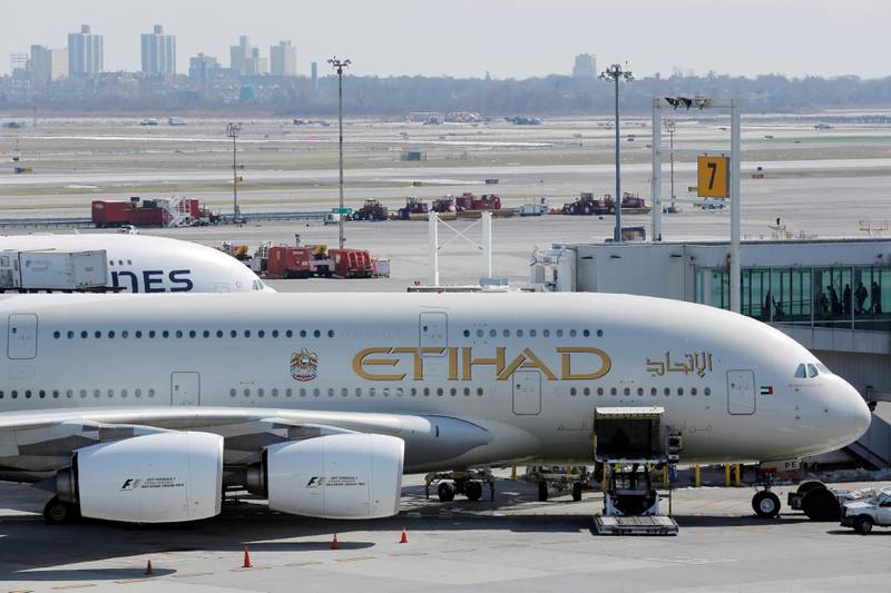 FILE PHOTO: An Etihad plane stands parked at a gate at JFK International Airport in New York, U.S., March 21, 2017.  REUTERS/Lucas Jackson/File Photo