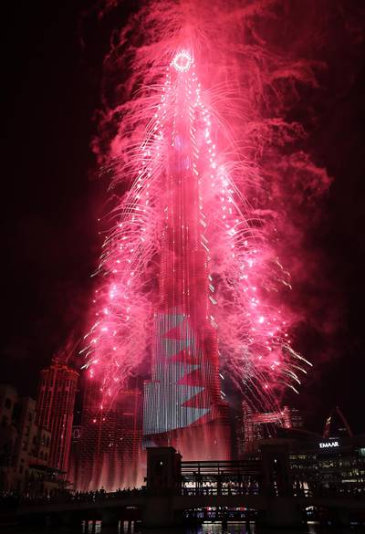DUBAI , UNITED ARAB EMIRATES – Dec 31 , 2019 : Fireworks display on Burj Khalifa for the new year 2020 celebration at Dubai Mall in Downtown Dubai in Dubai. ( Pawan Singh / The National ) For News/Online/Instagram