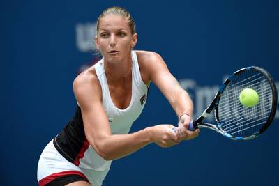 Karolina Pliskova of Czech Republic hits a return against Angelique Kerber. Timothy A Clary / AP Photo