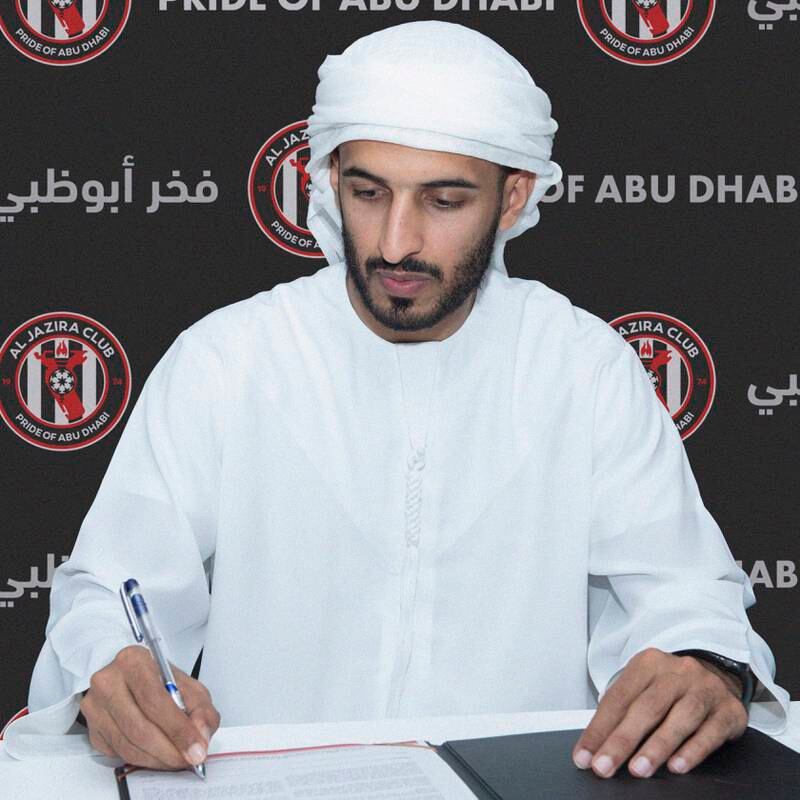 Ali Mabkhout signs his new Al Jazira contract.