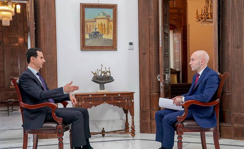 epa06774757 A handout photo made available by Syrian arab news agency (SANA) shows Syrian President Bashar al-Assad (L) giving an interview to Russian TV channel RT in Damascus, Syria, 30 May 2018 (Issued 31 May 2018). President Bashar al-Assad has said that with every move forward for the Syrian Army, and for the political process, and for the whole situation, forward in the positive meaning, towards more stability, our enemies and our opponents, mainly the West led by the United States and their puppets in Europe and the region, with their mercenaries in Syria, they try to make it farther, either by supporting more terrorism, bringing more terrorists to Syria, or by hindering the political process.  EPA/SANA HANDOUT  HANDOUT EDITORIAL USE ONLY/NO SALES
