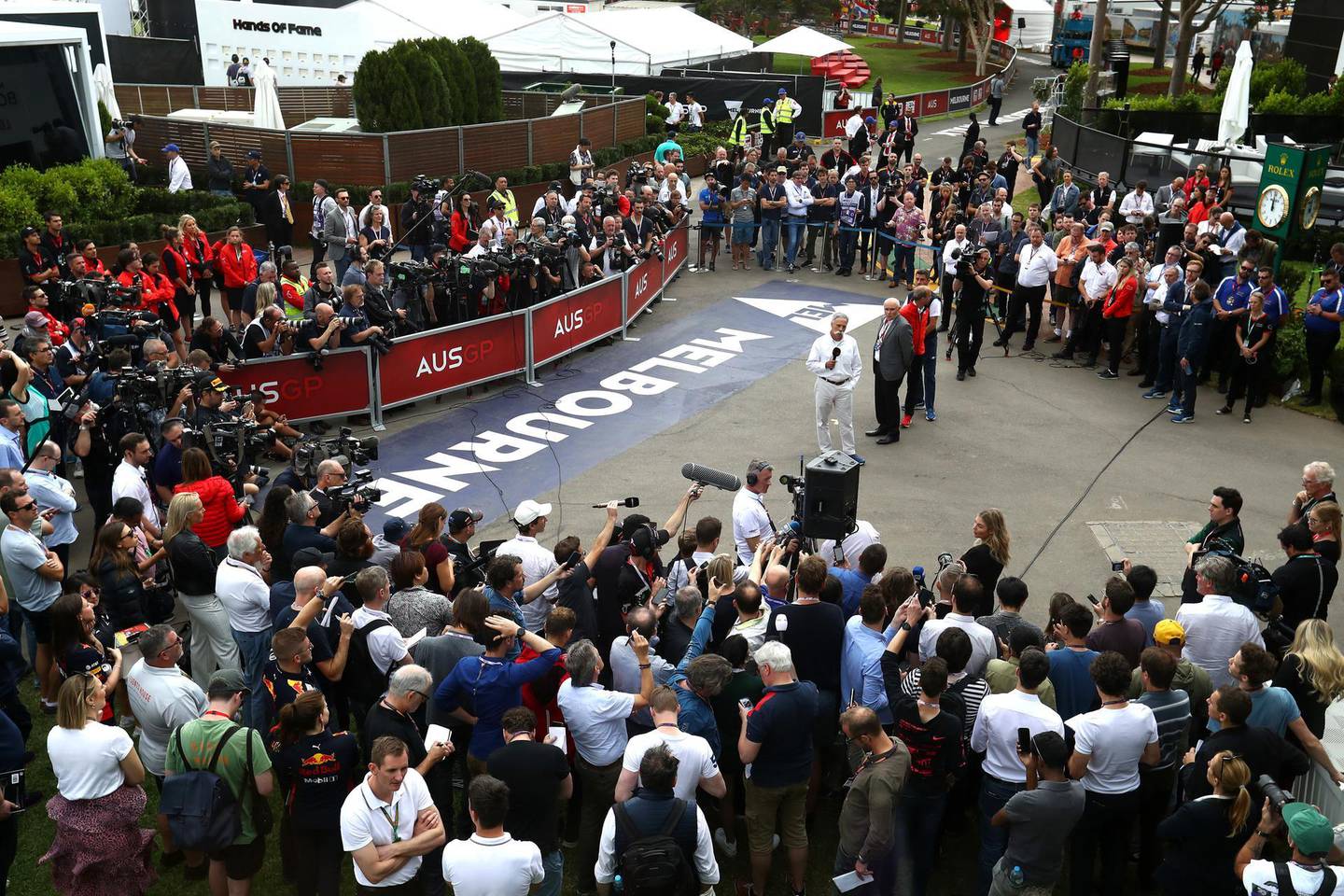 MELBOURNE, AUSTRALIA - MARCH 13: Chase Carey, CEO and Executive Chairman of the Formula One Group, talks as a press conference is held outside the paddock after for the F1 Grand Prix of Australia was cancelled at Melbourne Grand Prix Circuit on March 13, 2020 in Melbourne, Australia. (Photo by Robert Cianflone/Getty Images)
