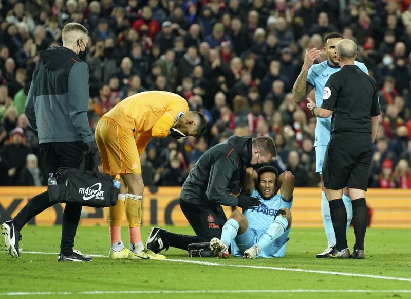 Newcastle's Isaac Hayden is injured during the Premier League match against home side Liverpool on Thursday night. AP