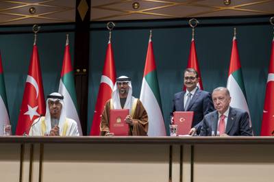 Sheikh Mohamed and Mr Erdogan watch a signing ceremony between UAE Energy Minister Suhail Al Mazrouei and his Turkish equivalent Fatih Donmez. Mohamed Al Hammadi / Ministry of Presidential Affairs
