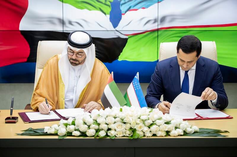 Mohammed Al Gergawi, Minister of Cabinet Affairs, signs the agreement in the company of Sardor Umurzakov, Uzbekistan's Deputy Prime Minister. Wam