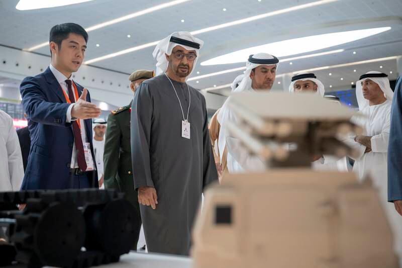 Sheikh Mohamed visits a booth at Idex