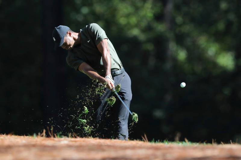 Tiger Woods tees-off on the 11th hole. AP
