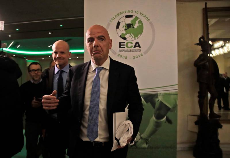FIFA president Gianni Infantino leaves at the end of European Club Association's (ECA) 20th General Assembly, in the organization's 10-year anniversary in Rome, Tuesday, March 27, 2018. (AP Photo/Alessandra Tarantino)