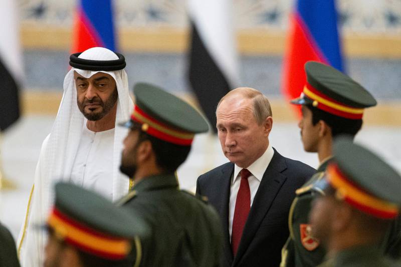 Russian President Vladimir Putin and Abu Dhabi Crown Prince Mohamed bin Zayed al-Nahyan attend the official welcome ceremony in Abu Dhabi, United Arab Emirates, October 15, 2019. Alexander Zemlianichenko/ Pool via REUTERS
