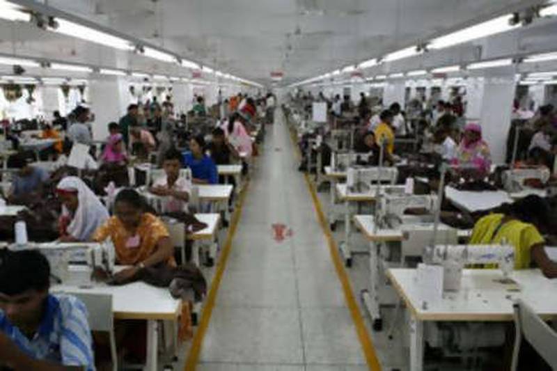 Workers sew H&M clothing at the Sterling garment factory in Dhaka.