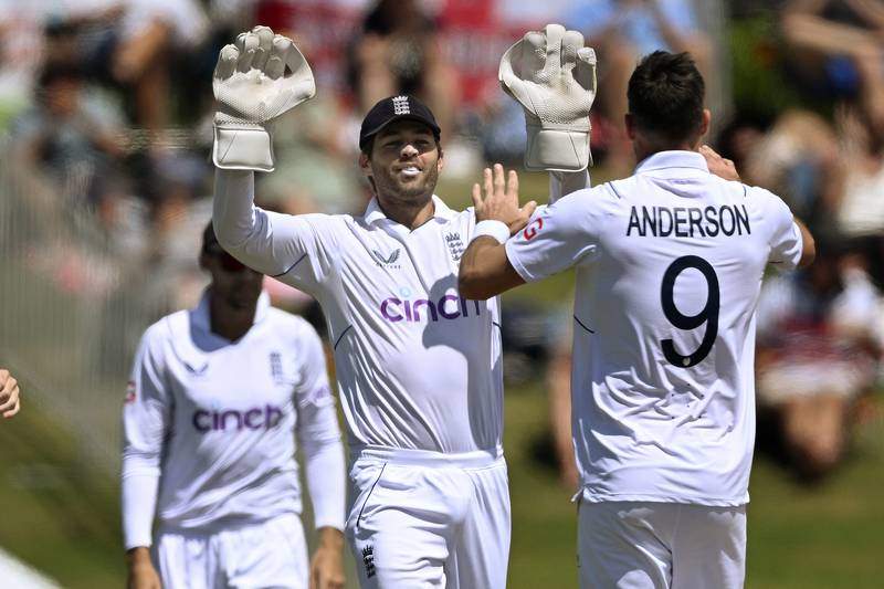 England's James Anderson, right, celebrates with teammate Ben Foakes after taking the wicket of New Zealand's Tim Southee. AP