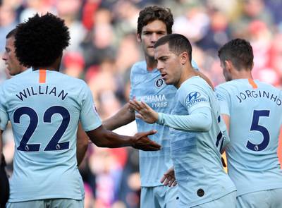 Soccer Football - Premier League - Southampton v Chelsea - St Mary's Stadium, Southampton, Britain - October 7, 2018  Chelsea's Eden Hazard celebrates scoring their first goal with Willian and team mates   REUTERS/Toby Melville  EDITORIAL USE ONLY. No use with unauthorized audio, video, data, fixture lists, club/league logos or "live" services. Online in-match use limited to 75 images, no video emulation. No use in betting, games or single club/league/player publications.  Please contact your account representative for further details.