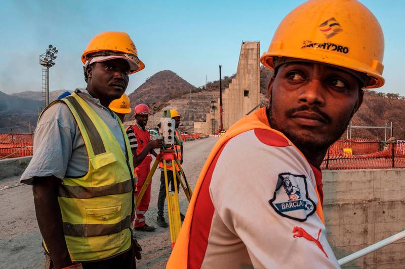 Workers are photographed at the Grand Ethiopian Renaissance Dam (GERD),  near Guba in Ethiopia.  AFP