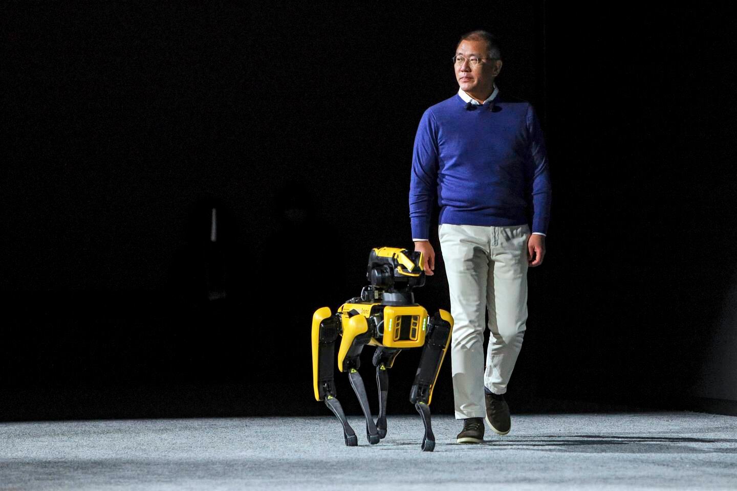 Euisun Chung, chairman of Hyundai Motor, takes the stage with the robot Spot from Boston Dynamics at the CES tech show in Las Vegas. AP