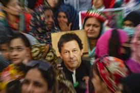Supporters of Pakistan's former prime minister Imran Khan, gather during a protest in Karachi on March 19, 2023, demanding the release of arrested party workers in recent police clashes. AFP
