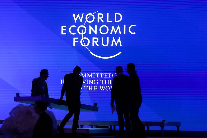 People set up the main stage at the congress center where the annual meeting of the World Economic Forum 2019, WEF, take place in Davos, Sunday, Jan. 20, 2019. (AP Photo/Markus Schreiber)