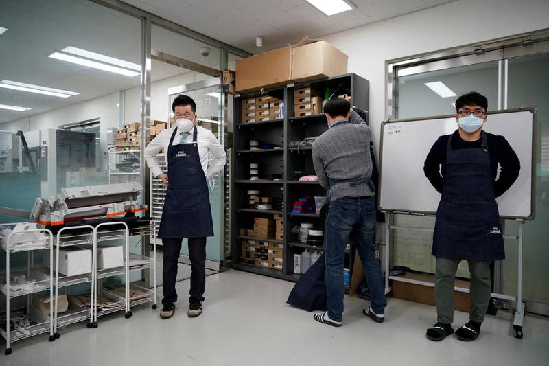 A professor of Pusan National University Park Hyun who used to be a coronavirus patient, prepares to work at Pusan National University in Busan, South Korea. Reuters