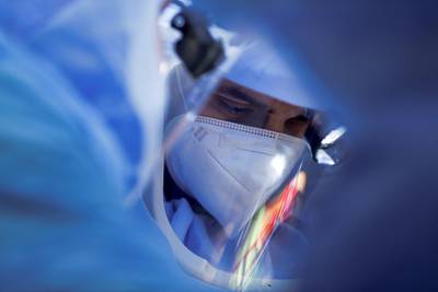 A surgeon uses the robotic arm known as "Mako" on a patient undergoing knee surgery, at the UPMC Salvator Mundi International Hospital in Rome, Italy. Reuters