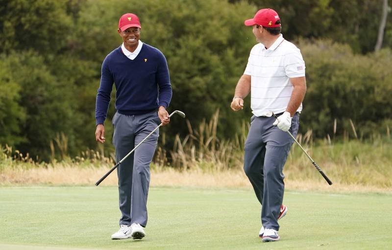 Playing Captain Tiger Woods (L) of the USA team and Patrick Reed. EPA