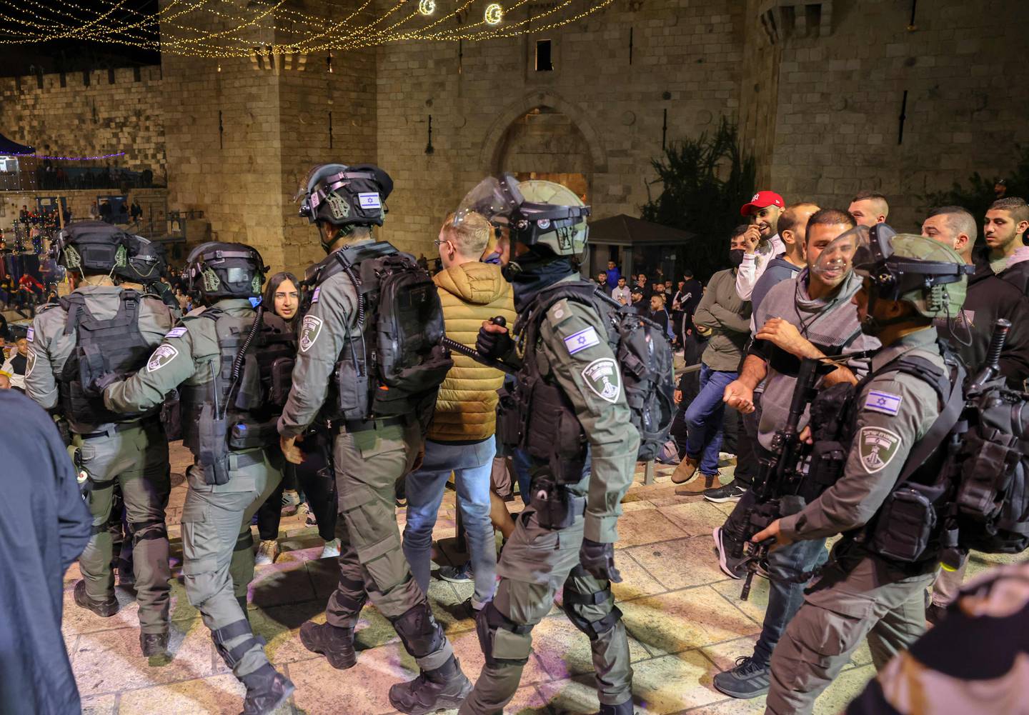 Israeli security forces gather outside the Damascus Gate in Jerusalem's Old City on Monday. AFP