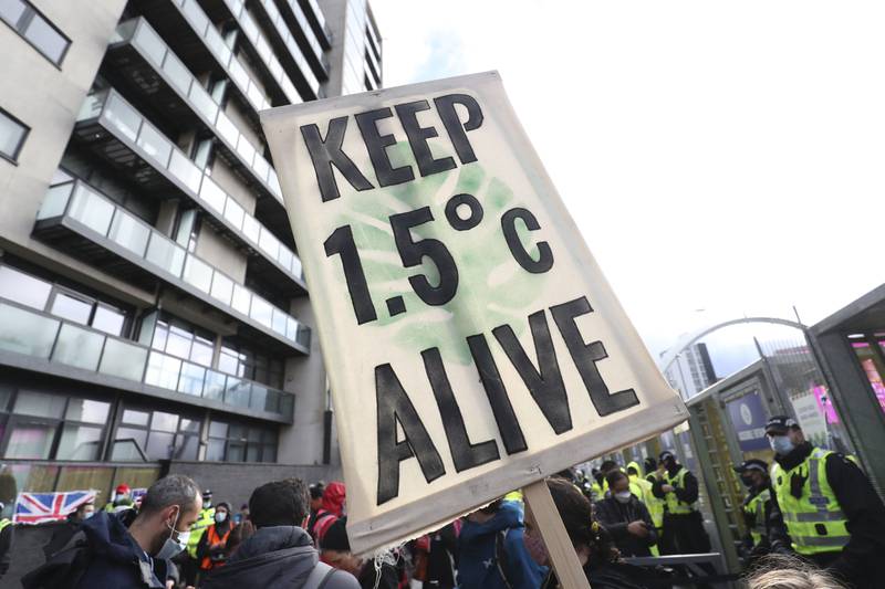 Activists demonstrate outside the Cop26 summit in Glasgow last year where global leaders met to discuss steps to cutting greenhouse emissions. AP Photo
